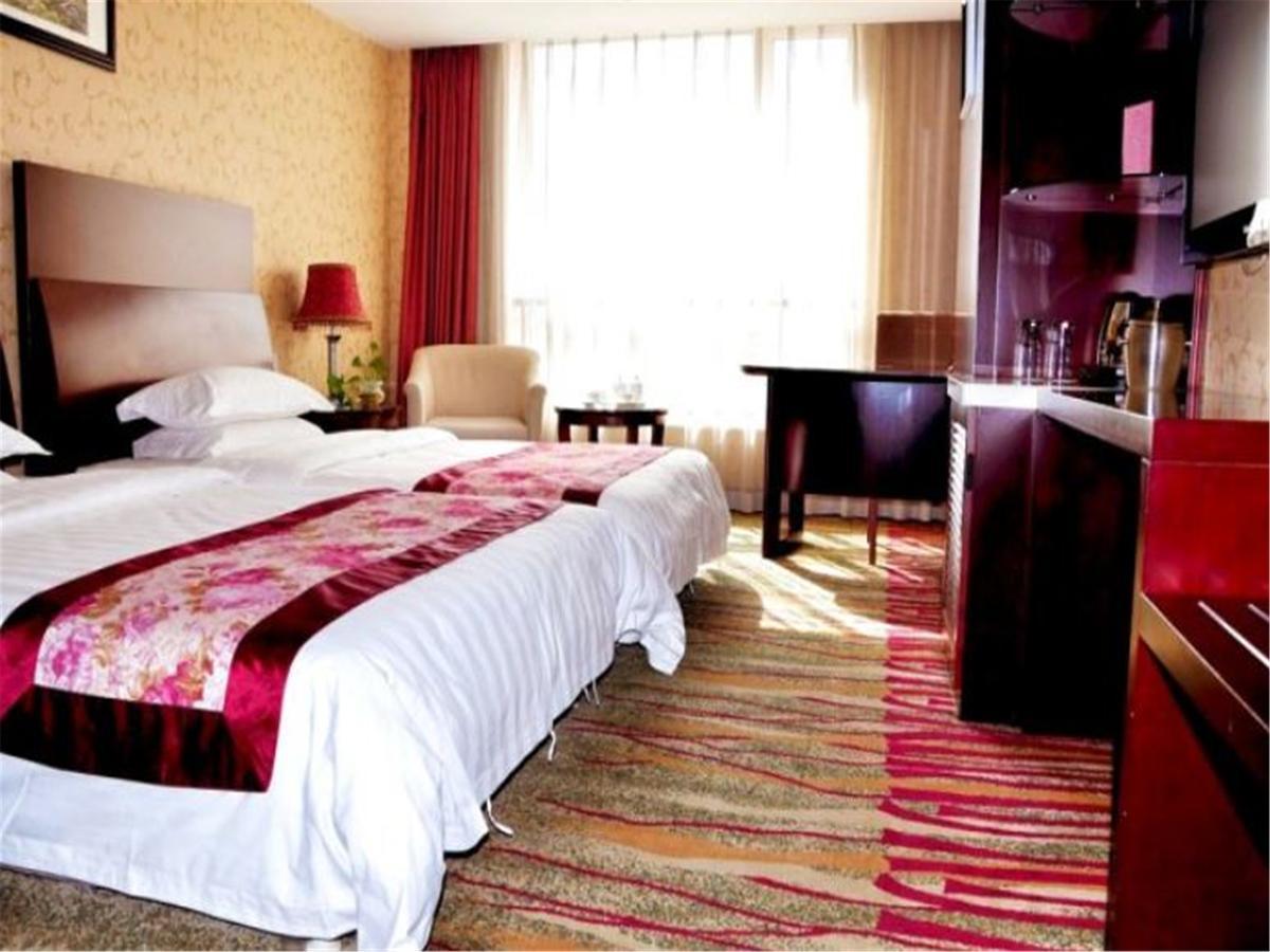 Dalian New Garden Hotel Exterior foto
